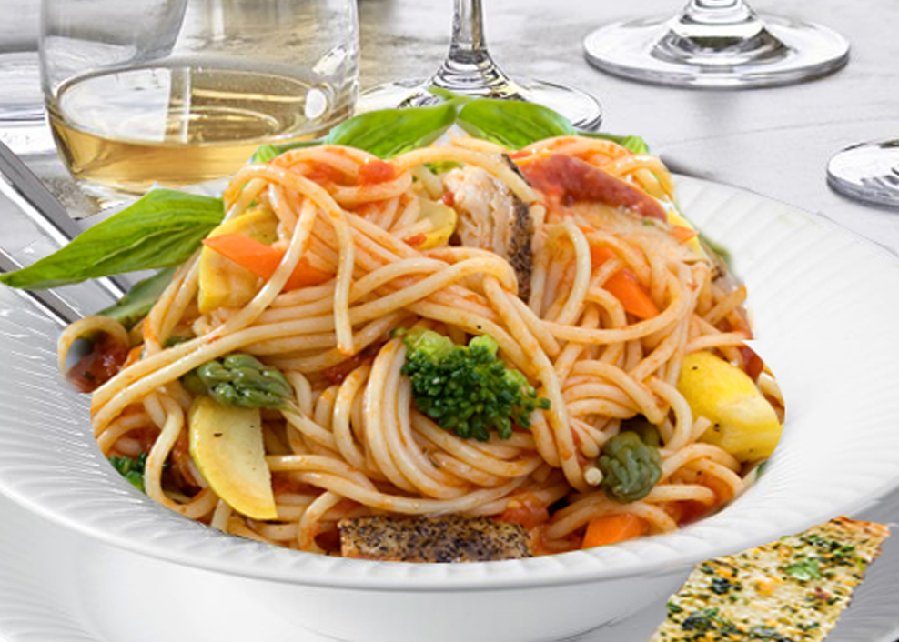 A plate of pasta with broccoli and other vegetables.