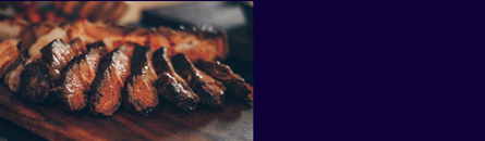 A close up of some meat on a table