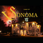 A building with fireworks in the background and words " journey of sonoma ".