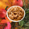 A bowl of food on top of some leaves